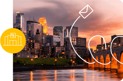 a city waterfront at dusk, overlaid with an envelope icon and a pharmacy icon