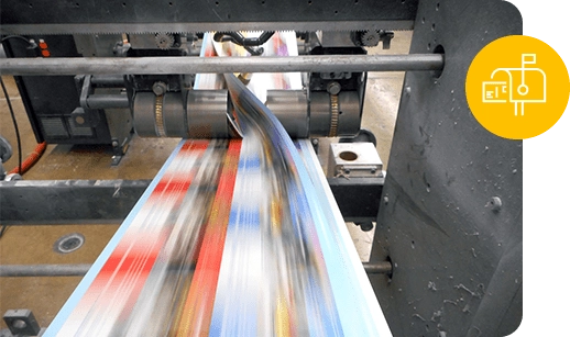 direct mail printed pieces pass under a machine rotor