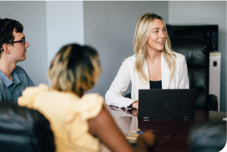 office workers enjoy a friendly meeting at a conference table