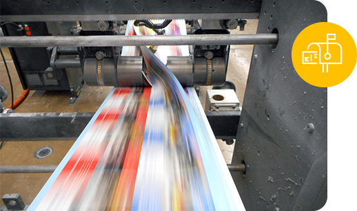 direct mail printed pieces pass under a machine rotor